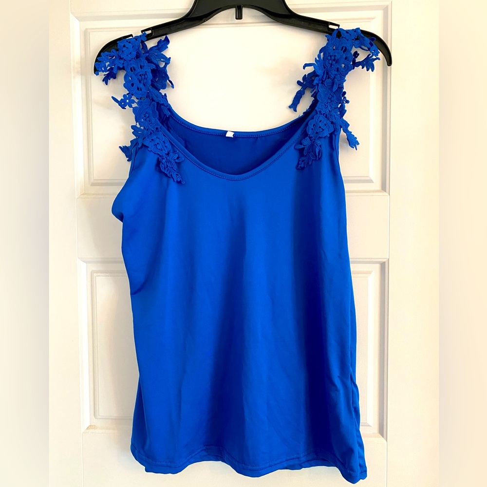 Blue blouse with lace shoulders